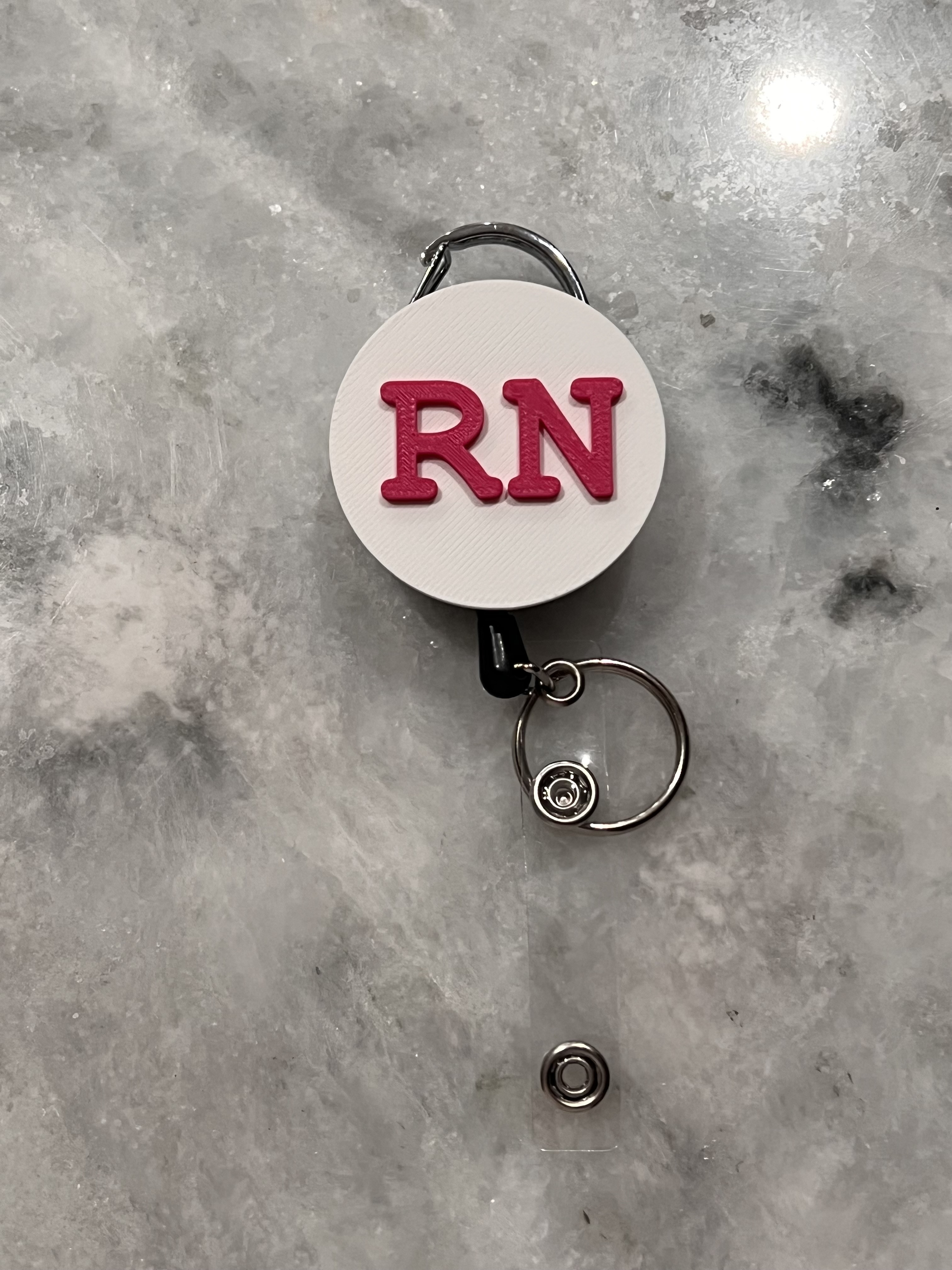 Стильная 3D-модель RN BADGE REEL TOPPER для 3D принтера