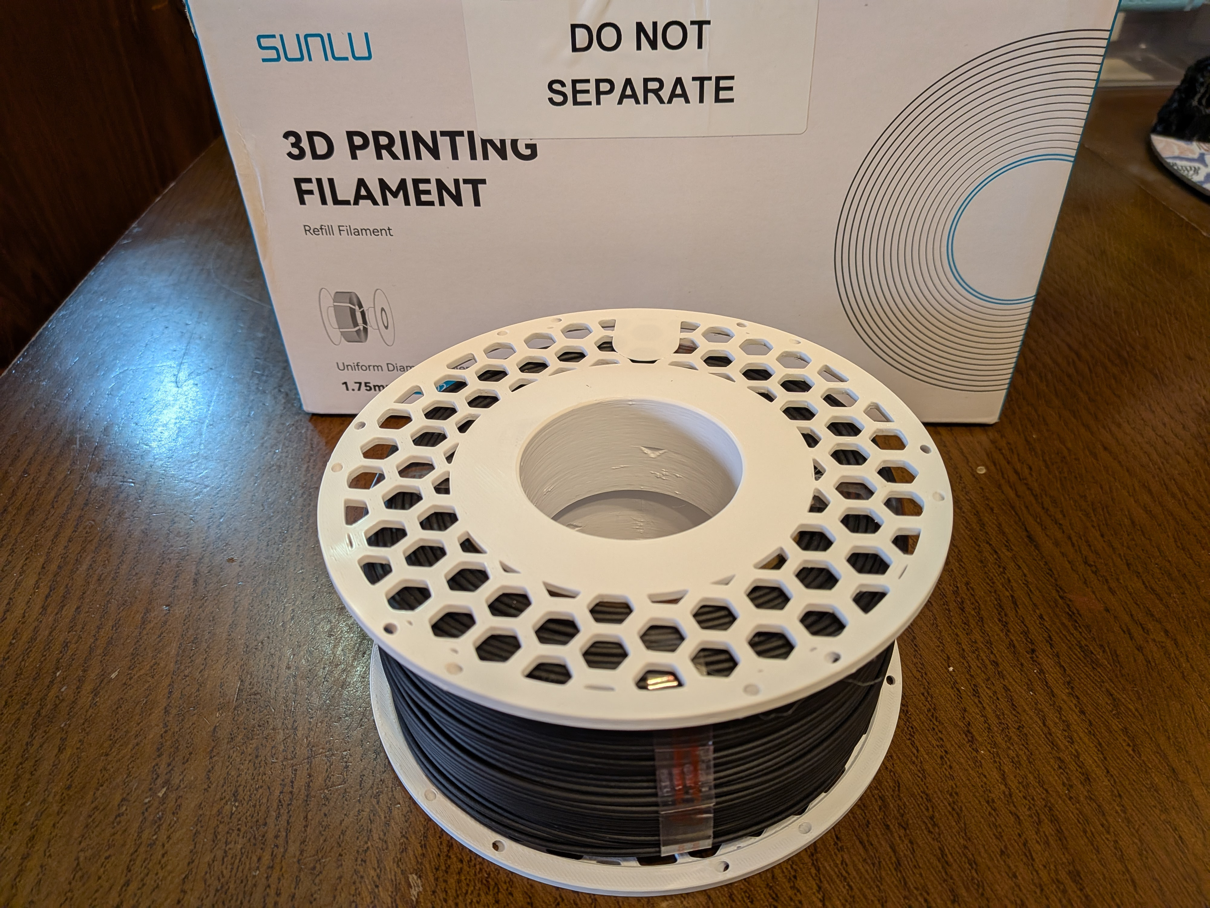 Экологичный держатель катушек Mini от Bambu Lab — компактность и забота о природе для 3D принтера